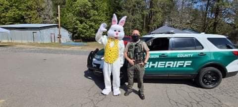 Easter Bunny with Jackson County Sheriff at annual Easter Egg Hunt